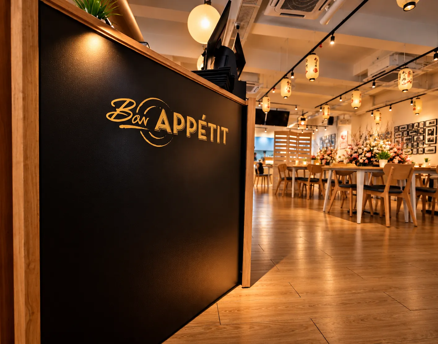 The black Bon Appétit wall at the front of the dining room